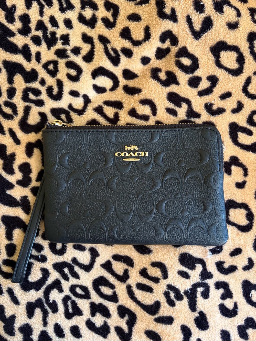Coach Black Embossed Logo Wristlet with Gold Accent